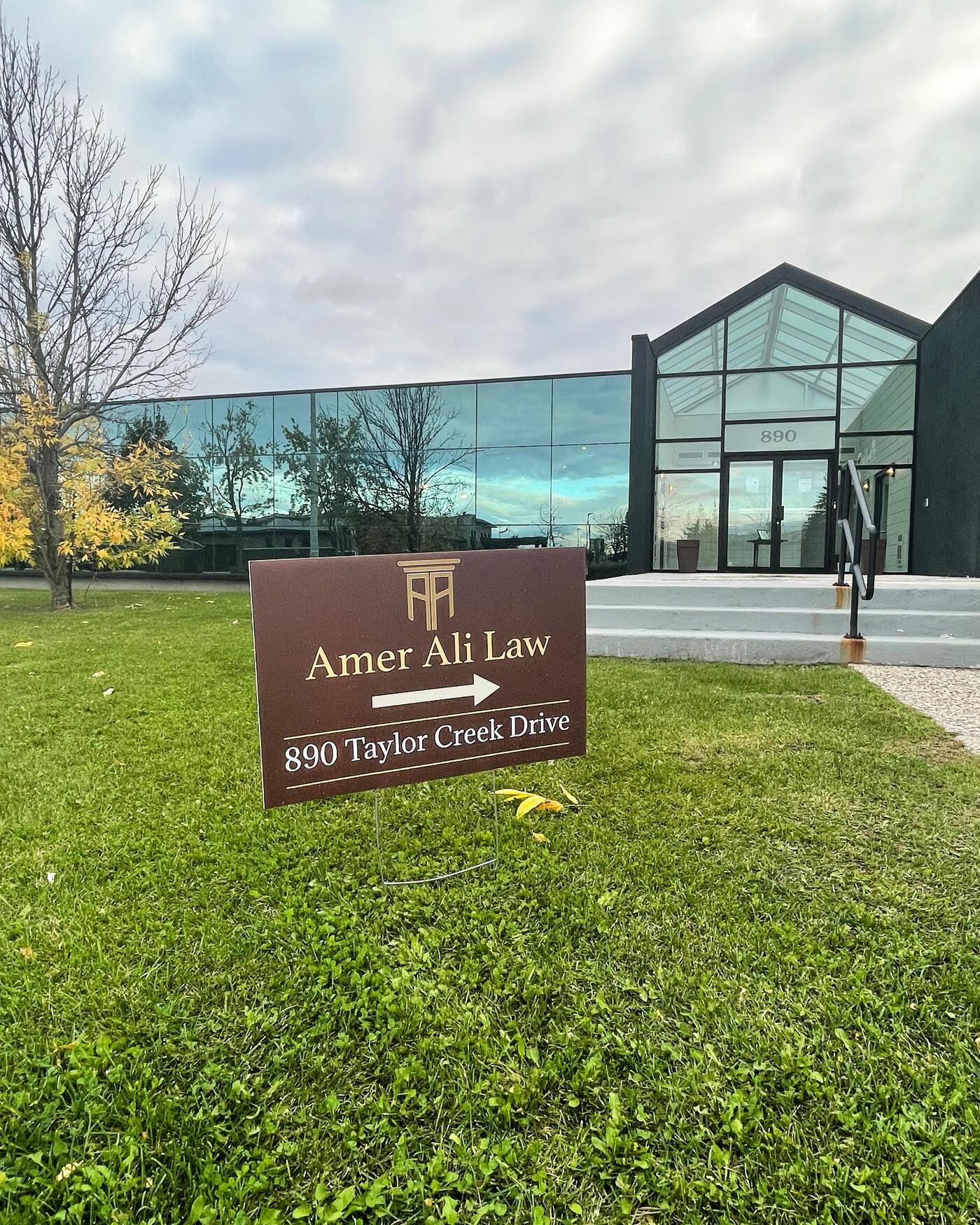 The Amer Ali Law sign outside 890 Taylor Creek Drive in Orleans